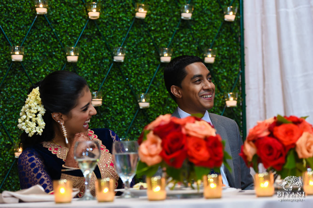 Bride and groom reaction photo during toasts