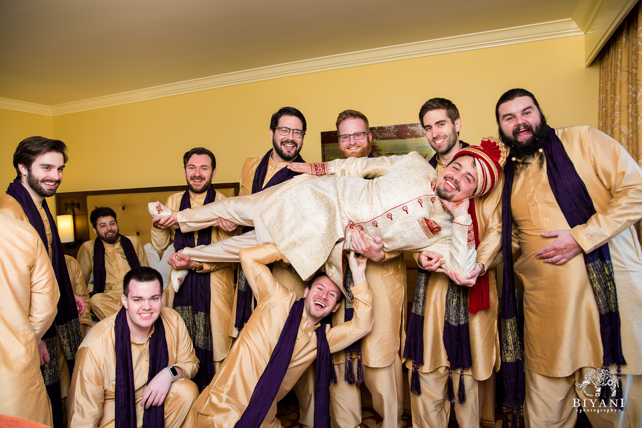 Groom and his groomsmen getting ready and taking silly photos during the Indian Fusion wedding in San Antonio, Tx.