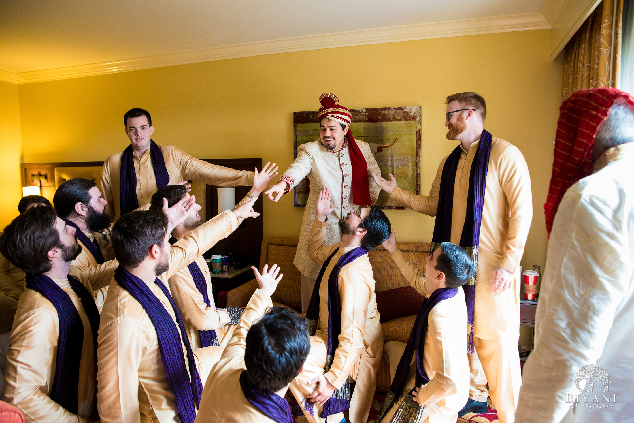 Indian Fusion Groom and groomsmen taking silly photos while getting ready  