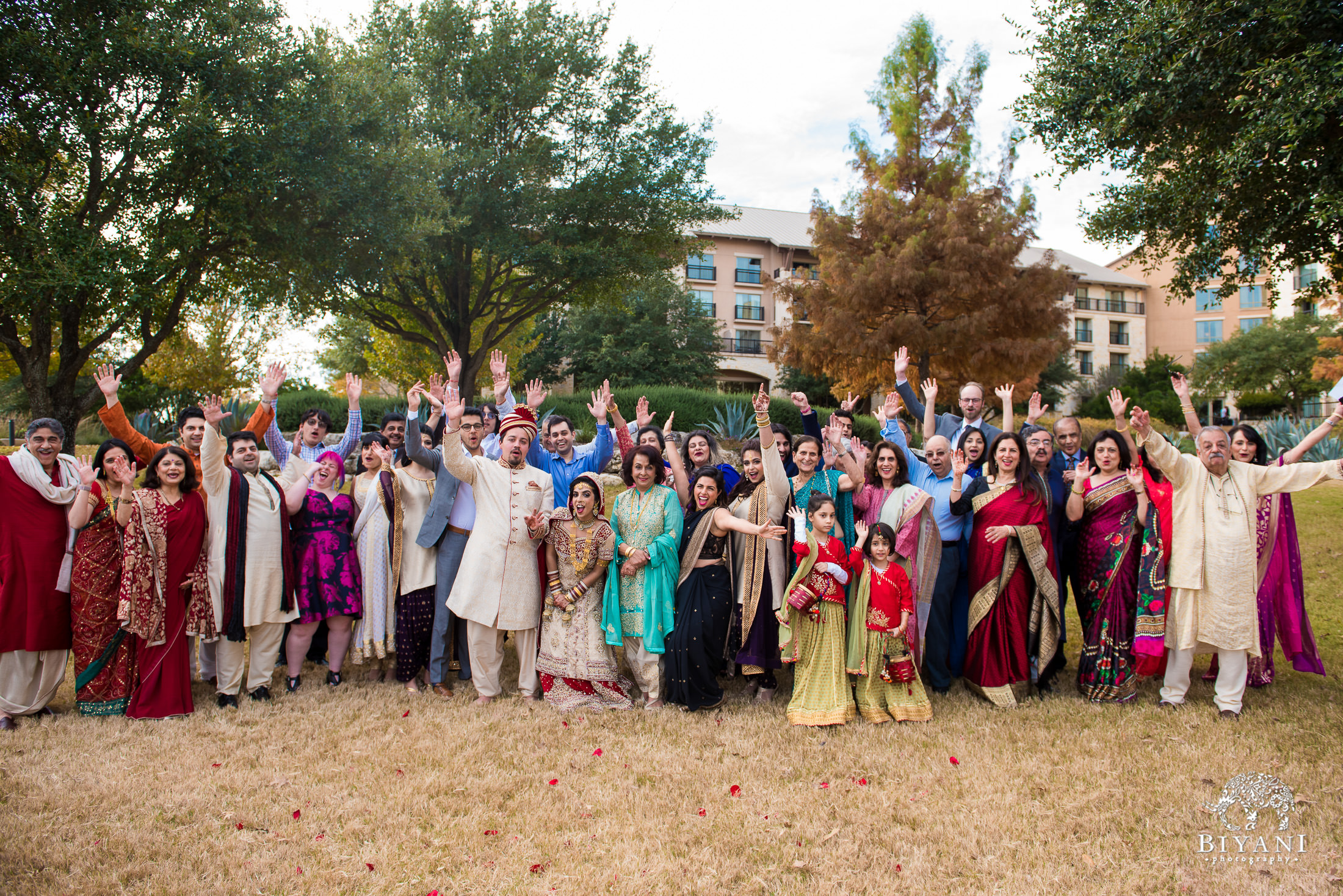 Indian Fusion Wedding Party group photo outdoors 